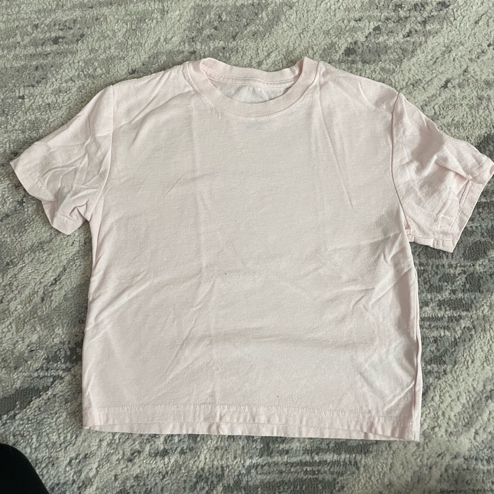 Washed but never worn size medium pale pink T-shirt